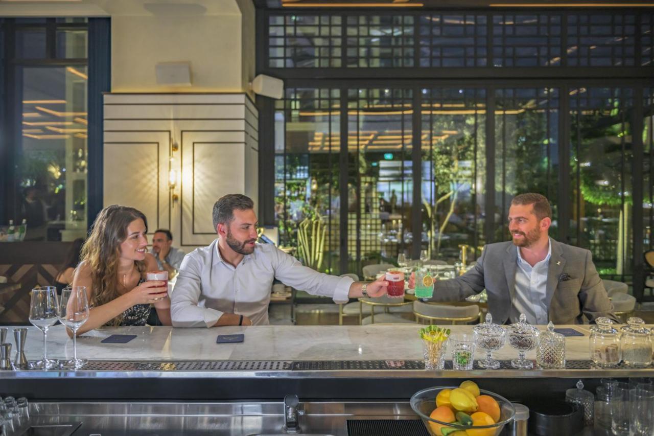 Grand Hyatt Amman Hotel Bagian luar foto The bar at the hotel